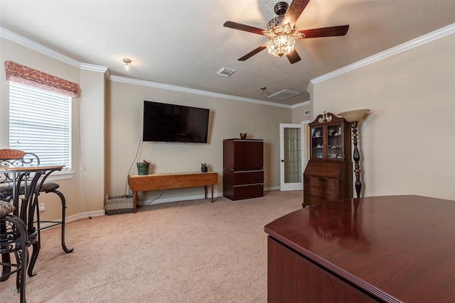 living area with a ceiling fan, baseboards, carpet floors, and ornamental molding