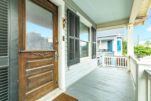 balcony featuring a porch