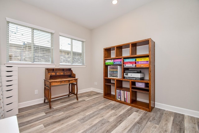 sitting room featuring wood finished floors and baseboards