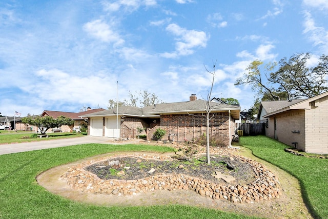 ranch-style home featuring brick siding, a front lawn, fence, concrete driveway, and a garage