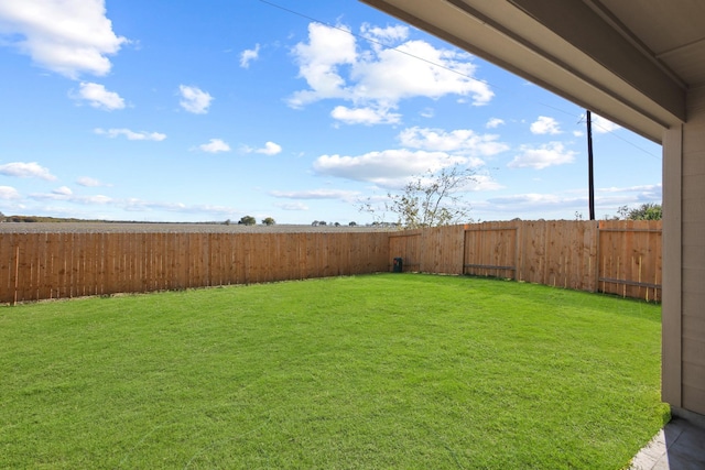 view of yard featuring a fenced backyard