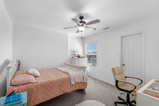 bedroom featuring visible vents, carpet flooring, baseboards, and ceiling fan