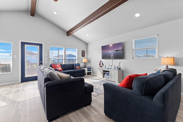 living area featuring baseboards, beamed ceiling, recessed lighting, light wood-style flooring, and a ceiling fan