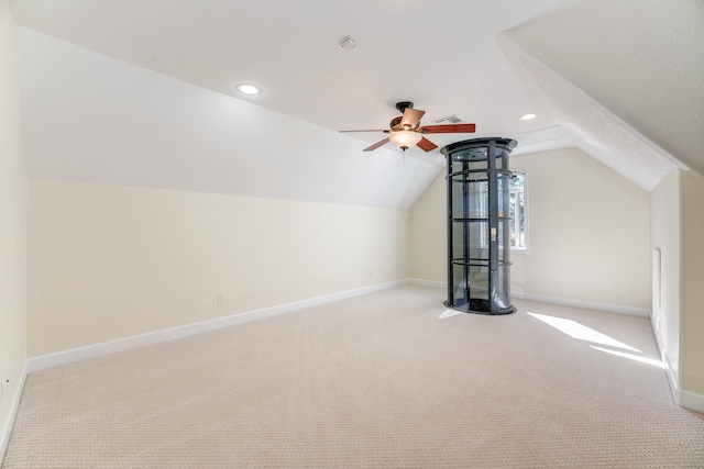 additional living space featuring lofted ceiling, recessed lighting, carpet, baseboards, and ceiling fan