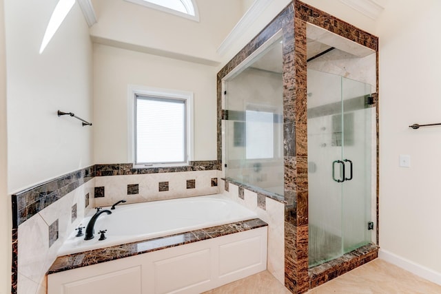 full bath featuring a garden tub, a shower stall, and crown molding