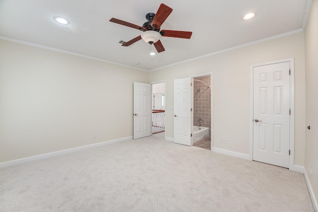 unfurnished bedroom with recessed lighting, carpet, crown molding, and baseboards