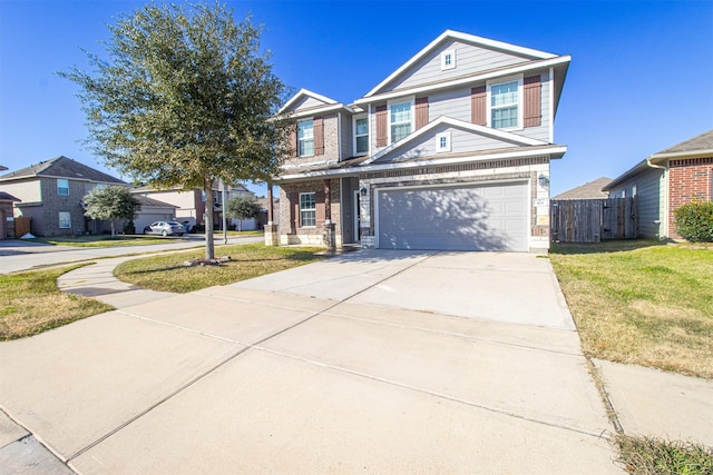 traditional-style house with brick siding, driveway, a front yard, and fence