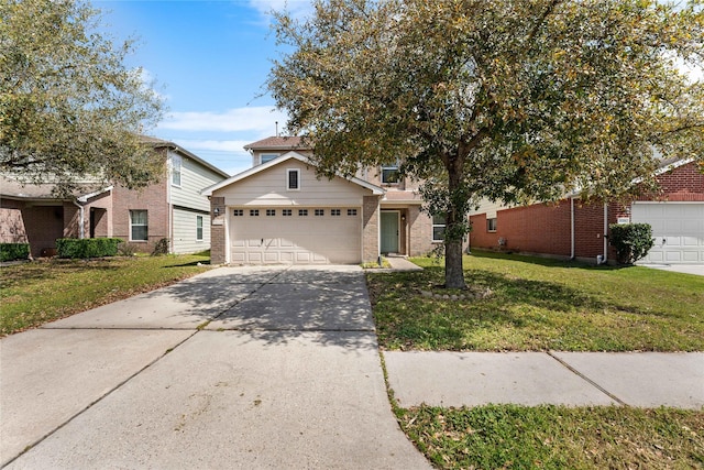 view of front of home with a front yard, concrete driveway, brick siding, and an attached garage