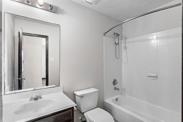 full bathroom with toilet, a textured ceiling, shower / bathing tub combination, vanity, and a textured wall