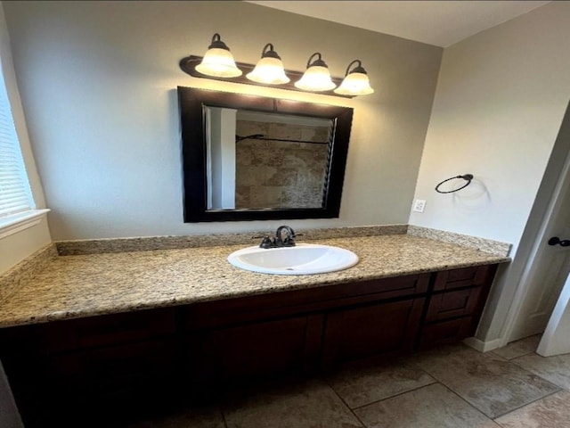 full bathroom featuring vanity and tile patterned floors