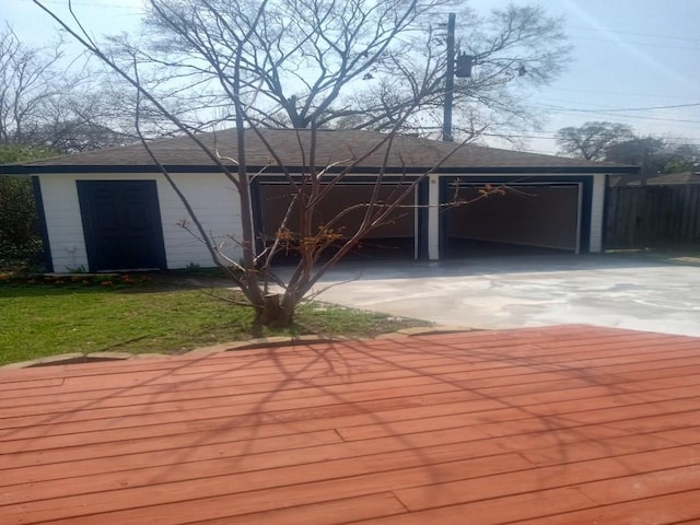 exterior space with fence and driveway