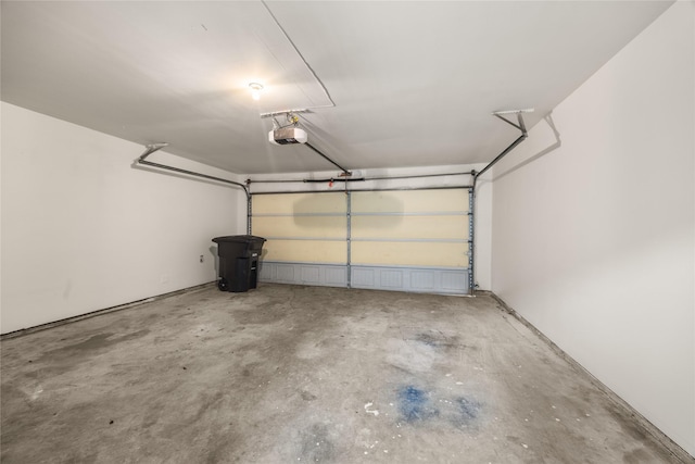 garage featuring a garage door opener