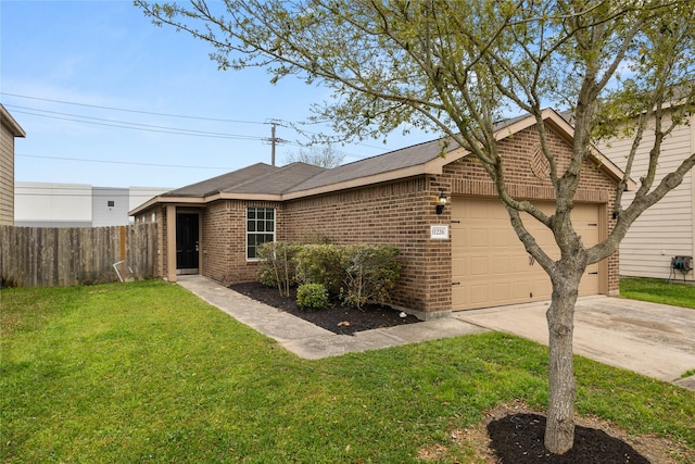 ranch-style home featuring driveway, fence, a front yard, a garage, and brick siding