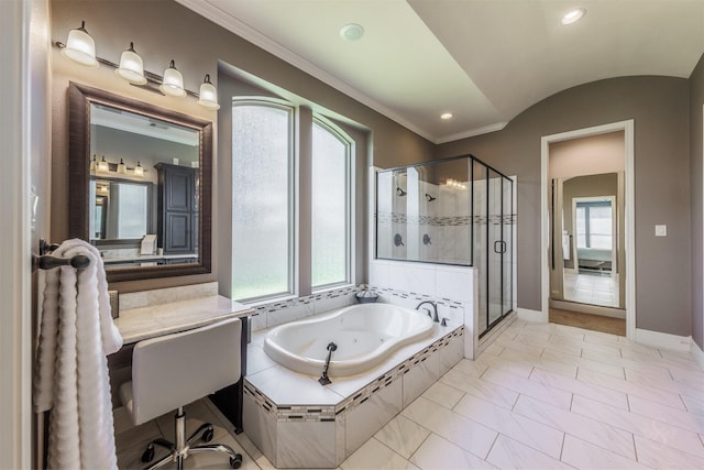 bathroom featuring a shower stall, a jetted tub, a healthy amount of sunlight, and crown molding