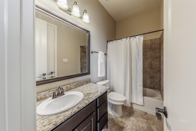 bathroom with toilet, shower / bath combo, and vanity