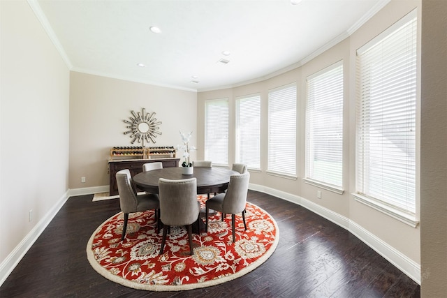 dining area with baseboards, dark wood finished floors, and ornamental molding