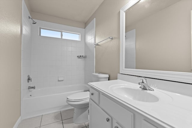 bathroom featuring tile patterned floors, vanity, toilet, and shower / bathtub combination