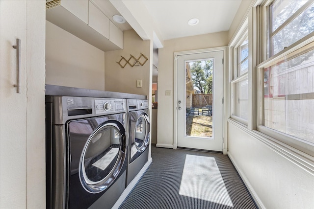 1802 Lexington St, Houston, TX 77098 - laundry room featuring washing machine and clothes dryer and dark carpet