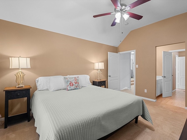 bedroom with a ceiling fan, vaulted ceiling, light colored carpet, and baseboards