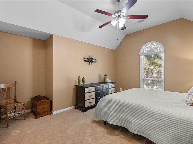 bedroom featuring baseboards, visible vents, lofted ceiling, ceiling fan, and light carpet