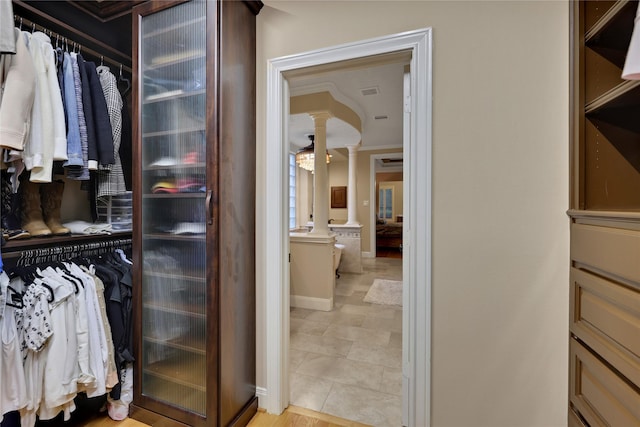 2814 S Cotswold Manor Dr, Kingwood, TX 77339 - spacious closet featuring decorative columns