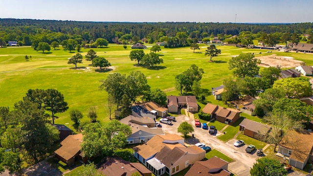 drone / aerial view featuring a residential view and view of golf course