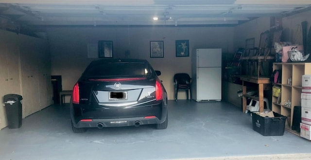 garage featuring freestanding refrigerator