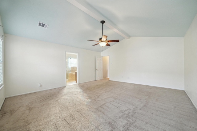 unfurnished room with lofted ceiling with beams, visible vents, carpet floors, and ceiling fan