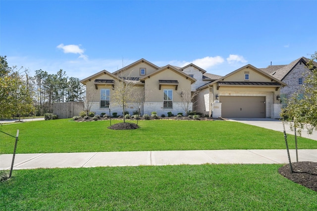 view of front facade with a front lawn, concrete driveway, stucco siding, a garage, and stone siding