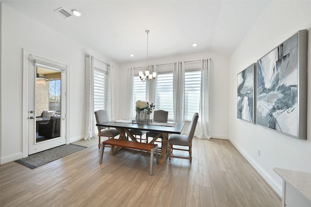 dining space with visible vents, baseboards, a chandelier, recessed lighting, and light wood-style floors