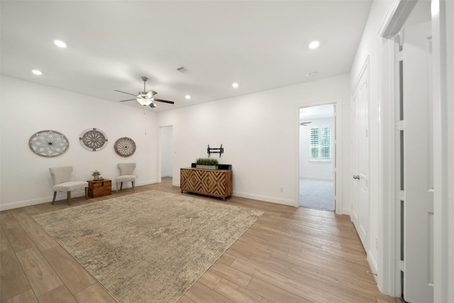 unfurnished room with recessed lighting, light wood-type flooring, visible vents, and a ceiling fan