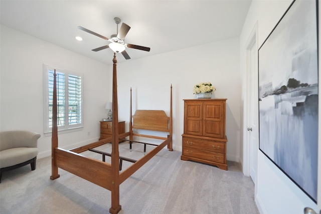 bedroom featuring recessed lighting, baseboards, and light carpet