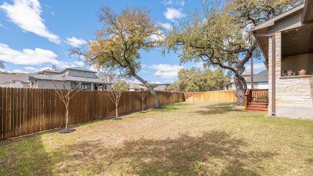 view of yard featuring a fenced backyard