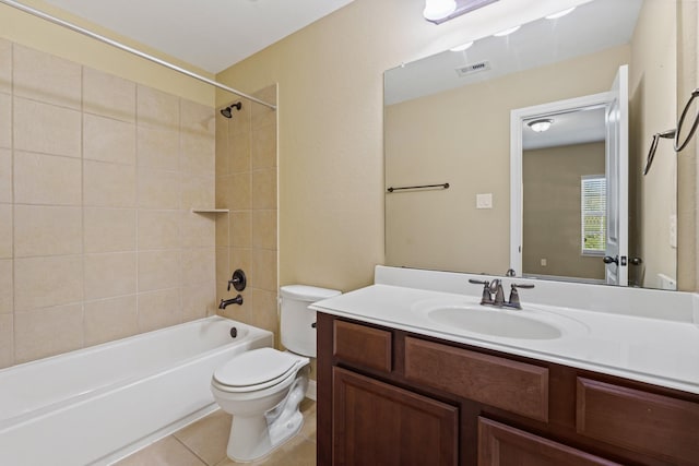 bathroom with visible vents, toilet, shower / bathing tub combination, tile patterned flooring, and vanity