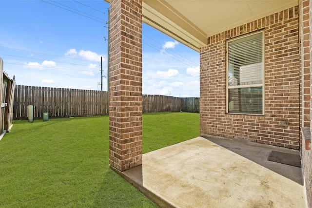 view of yard featuring a patio and a fenced backyard