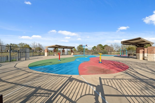 view of pool featuring fence