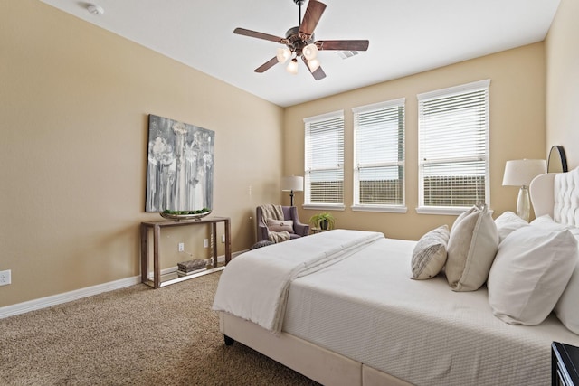 bedroom with baseboards, carpet, and a ceiling fan