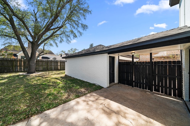 exterior space with a patio area and fence