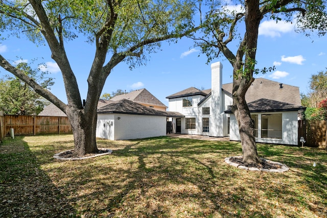 view of yard featuring a patio and fence