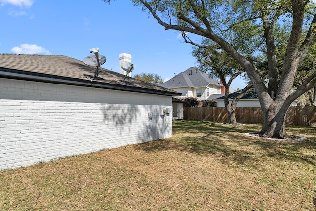 view of yard with fence