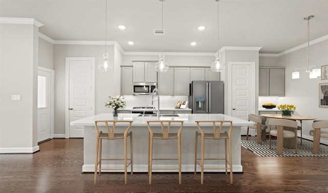 8821 Knoll Branch Dr, Houston, TX 77080 - kitchen with a center island with sink, light countertops, a sink, and appliances with stainless steel finishes