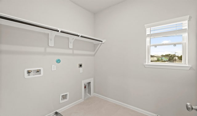 8821 Knoll Branch Dr, Houston, TX 77080 - laundry area with hookup for an electric dryer, baseboards, hookup for a gas dryer, washer hookup, and laundry area