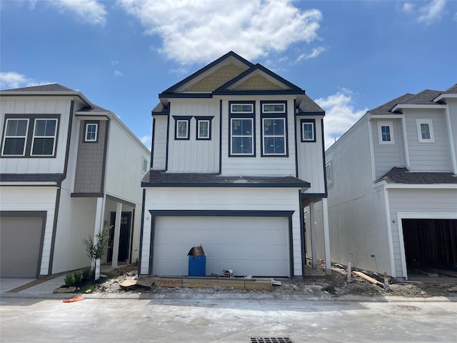 8821 Knoll Branch Dr, Houston, TX 77080 - view of front of property with an attached garage, roof with shingles, and board and batten siding