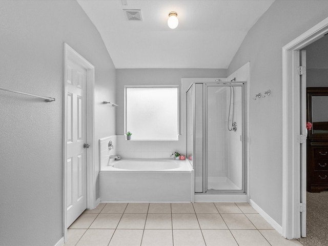 full bathroom with visible vents, a bath, a shower stall, and tile patterned flooring