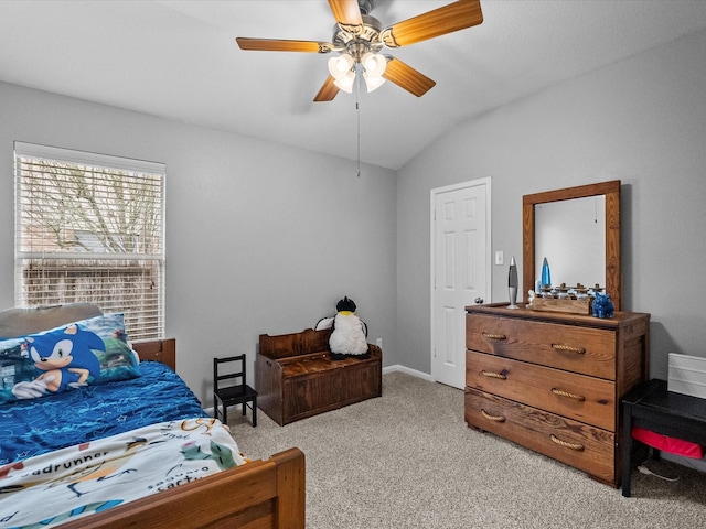 bedroom with baseboards, carpet, ceiling fan, and vaulted ceiling