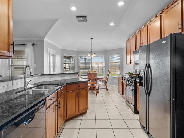 kitchen featuring visible vents, black appliances, ornamental molding, a sink, and light tile patterned floors