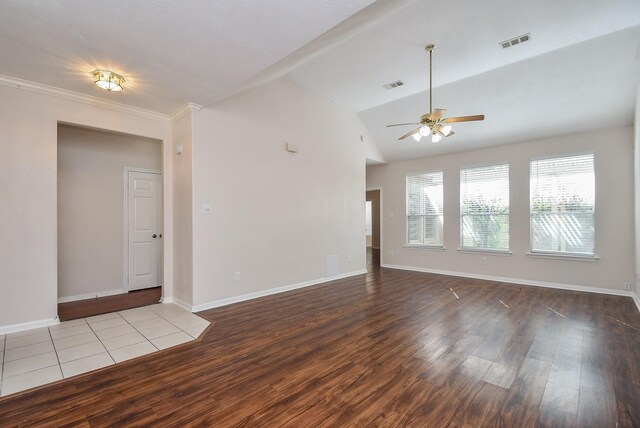 unfurnished living room featuring baseboards, wood finished floors, visible vents, and ceiling fan