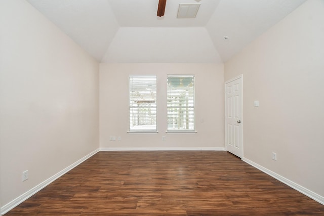 unfurnished room with dark wood finished floors, baseboards, lofted ceiling, and ceiling fan