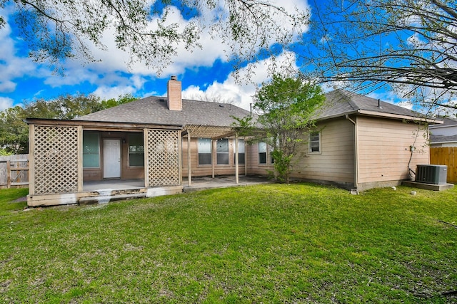 back of house featuring a patio, fence, a lawn, and a pergola