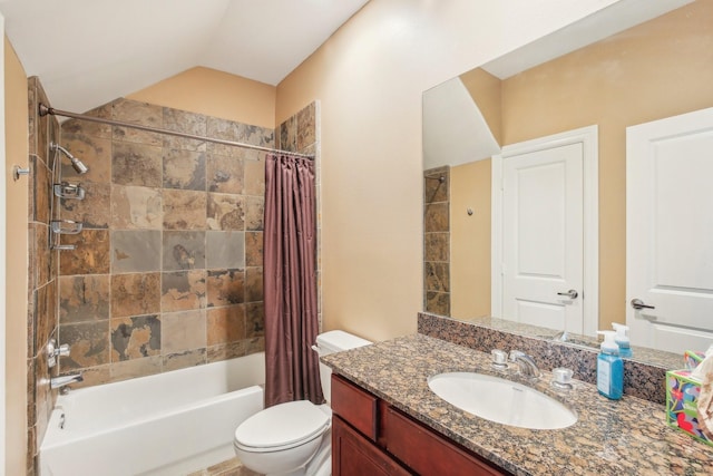 full bathroom featuring lofted ceiling, shower / tub combo with curtain, vanity, and toilet